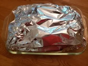 Baked Cabbage and Onions wrapped in foil ready to bake