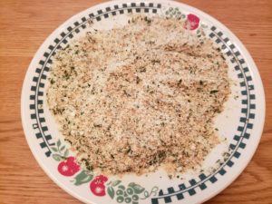 breading of parmesan cheese, flaxseed meal and almond meal on a plate