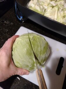 cutting a cabbage in half