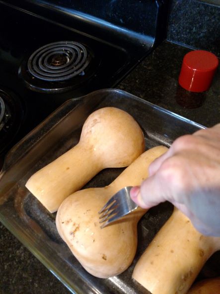 poking squash with fork