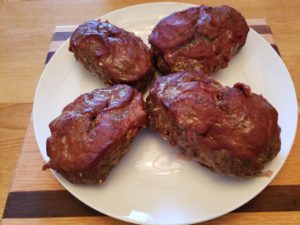 Paleo Meatloaf baked and on white serving dish