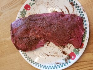 steak with seasonings rubbed on