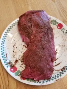 steak with seasonings rubbed on