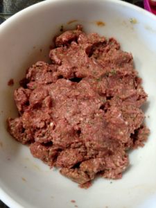 ingredients for paleo meatloaf mixed together