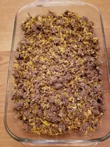 beef, soup mix and cheese spread into baking dish.