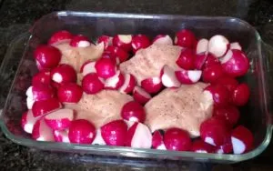chicken and radishes in baking dish