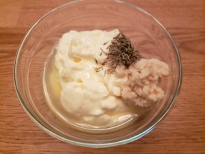 Lemon Herb Mayonnaise in bowl before being mixed together