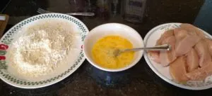 "breading", egg dip and chicken lined up to prepare