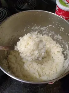 cauliflower after being cooked in a saucepan and mashed