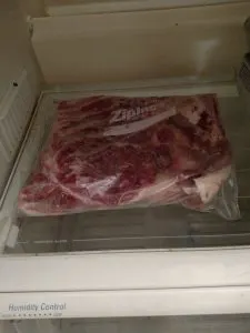 pork belly in Ziploc bag in refrigerator