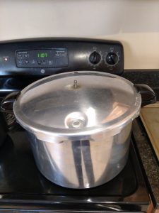 canner on stove with lid on.