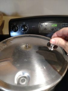 removing the pressure regulator from canner.