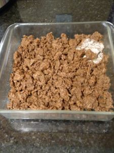 taco meat in glass baking dish