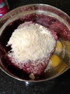 Ingredients for Low Carb Crock Pot Meatballs unmixed in a bowl