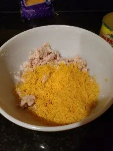 chicken and cheeses in bowl