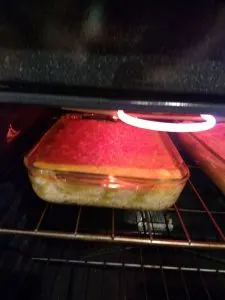 Chicken Enchilada Casserole in oven