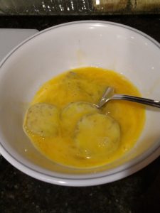 eggplant in bowl with egg