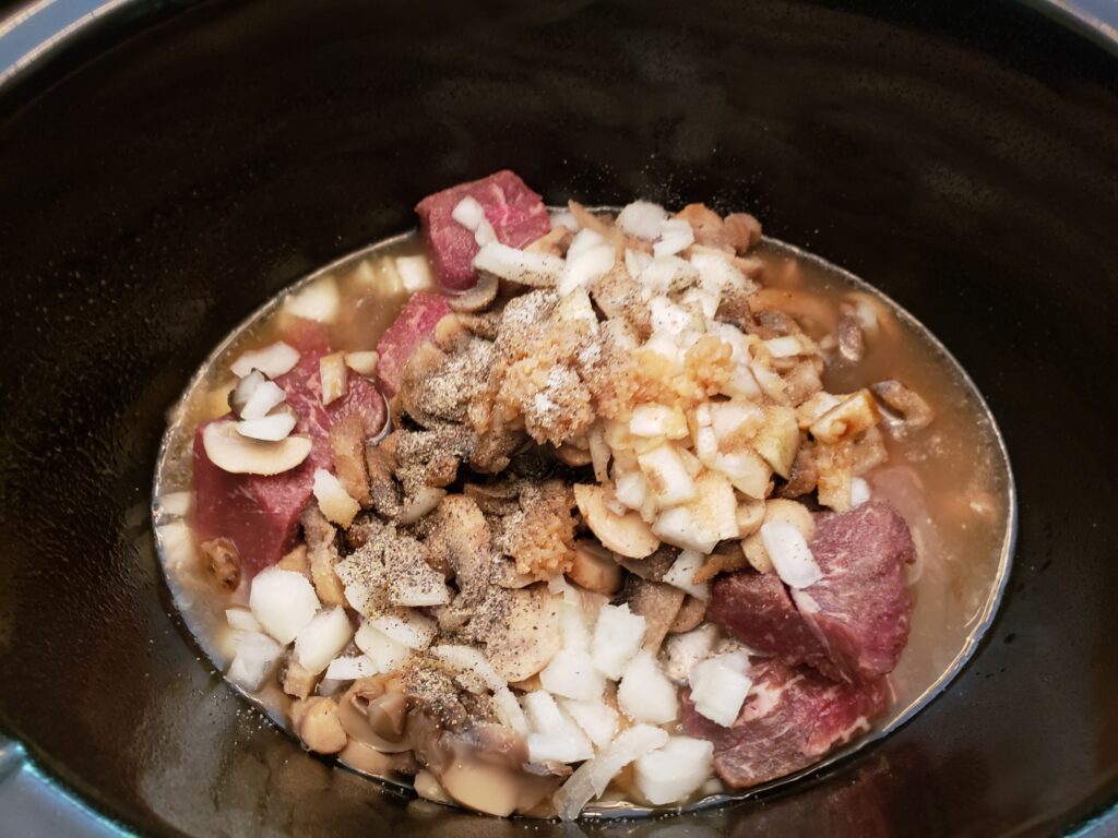 Crock Pot Beef Stroganoff uncooked in crock pot