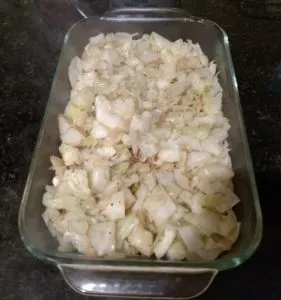 cabbage and onion in baking dish