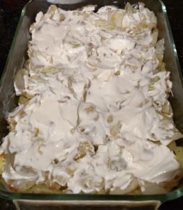 cabbage and onion with sour cream on top