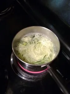 boiling zoodles in pot of water