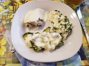 chicken, broccoli and mashed cauliflower covered in alfredo sauce