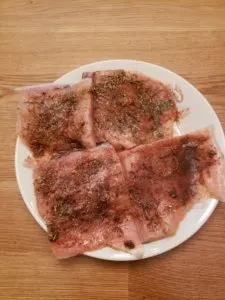 Blackened Salmon with seasoning on plate