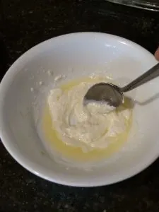 melted butter and cream cheese stirred together in bowl