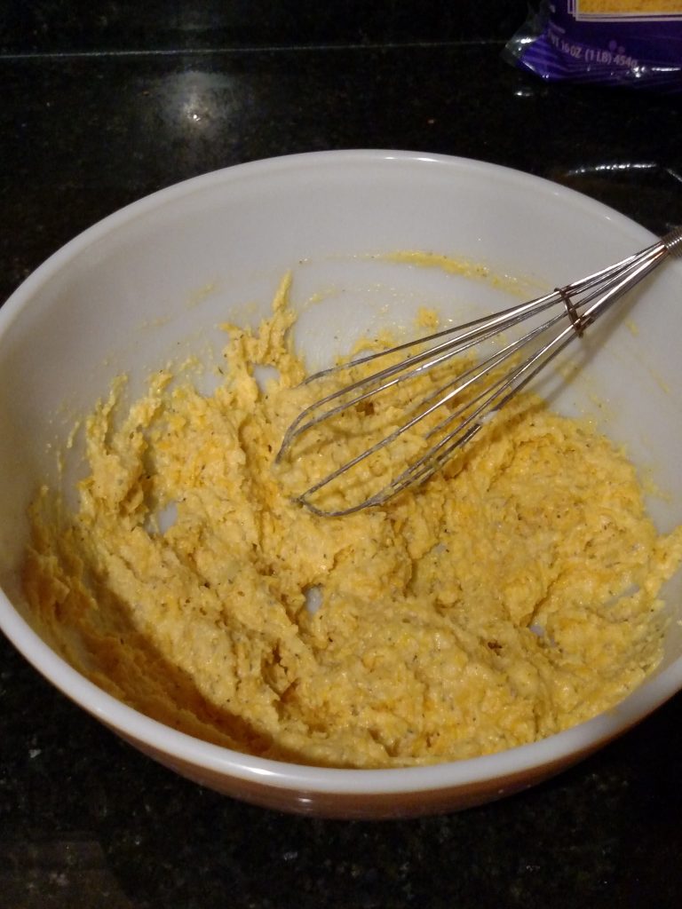 mixing batter in bowl