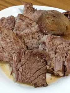 beef roast slice on a plate for serving