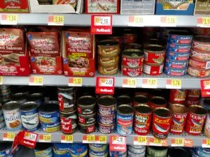 store shelf of canned fish