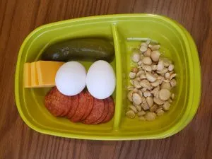 Pepperoni, cheese, pickle, hard boiled eggs and macadamia nuts