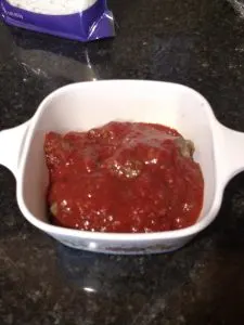 meatballs with spaghetti sauce on them.