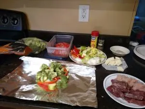 ingredients for Keto Meat and Vegetable Foil Packets set out on counter 