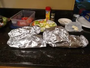several Keto Meat and Vegetable Foil Packets on counter