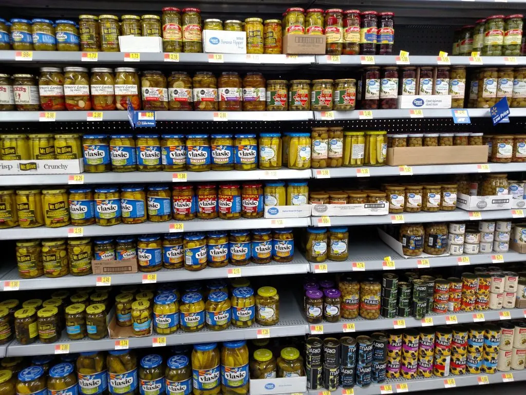 pickles and olives on store shelves