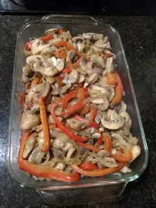 meat and vegetables in casserole dish