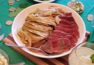 Corned beef and cabbage on white plate