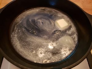 butter melting in skillet