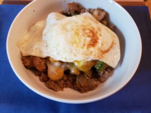 Keto Sausage Vegetable Breakfast Bowl with an egg on top