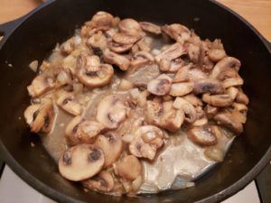 mushrooms and butter in skillet