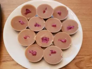 Peanut Butter Jelly Fat Bombs on white plate