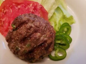 Low Carb Jalapeno Cheddar Burgers served with lettuce, tomato and jalapeno