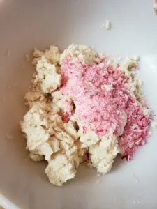 mixing in the crushed candies