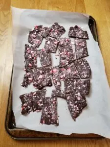 Keto Chocolate Peppermint Bark on parchment paper