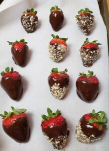 Keto Chocolate Covered Strawberries on parchment paper