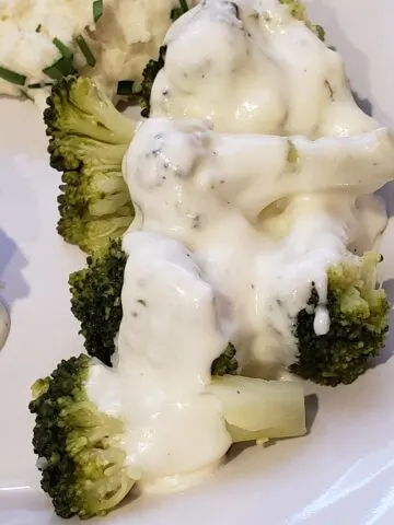 Easy Homemade Alfredo Sauce over broccoli