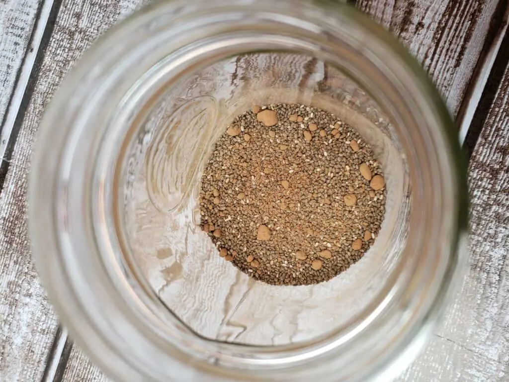 chia seeds and cocoa powder in mason jar