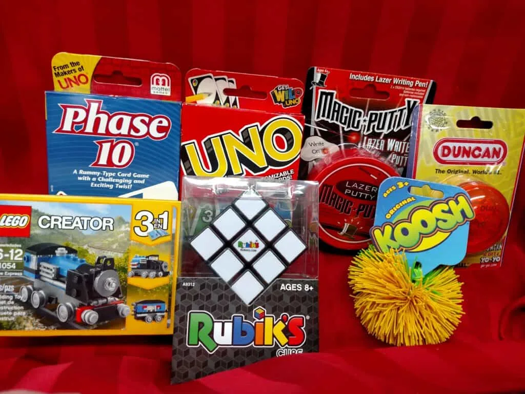 Lego creator set, card games, rubik's cube, silly putty, koosh ball, yo-yo