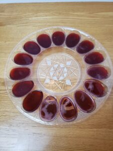 dark red jello in deviled egg mold